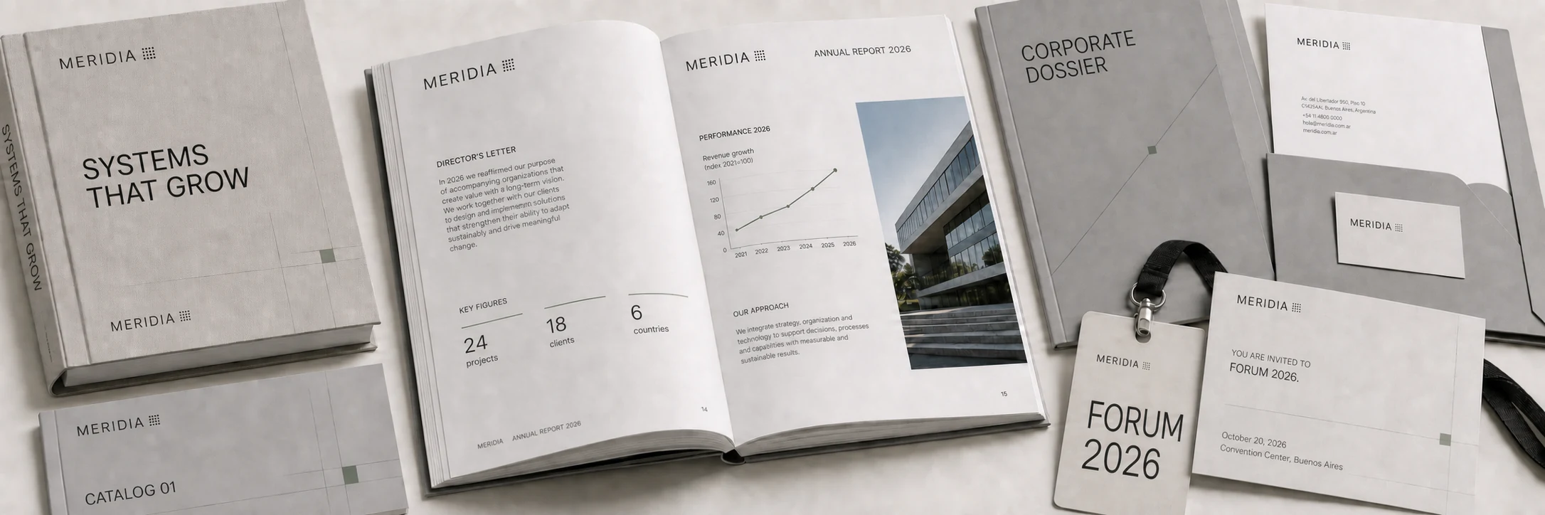 MERIDIA editorial system with open annual report, book, catalog, corporate dossier, stationery and event credential