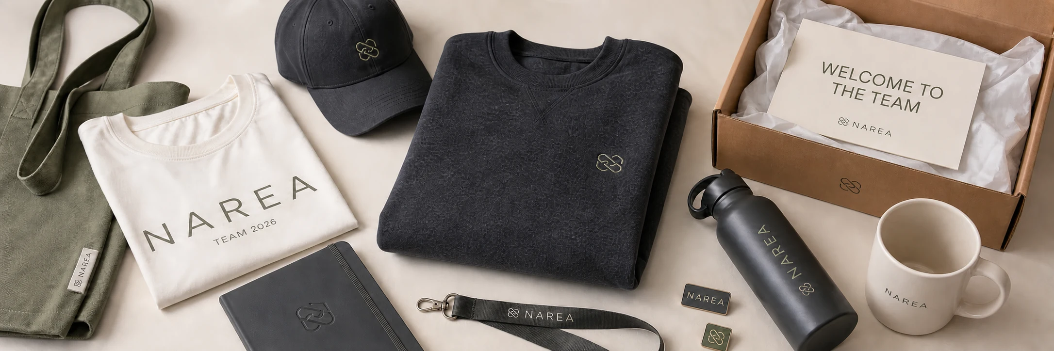 NAREA welcome kit with apparel, tote bag, cap, notebook, bottle, mug, lanyard, pins and corporate card